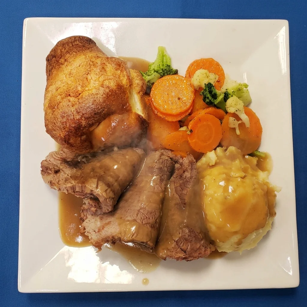 Roast beef dinner with Yorkshire pudding, mashed potatoes, gravy and seasonal vegetables at Cheryl's Country Kitchen in Airdrie, AB