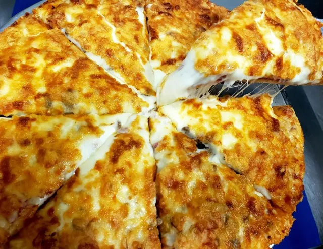 Cheese Pizza at Cheryl's Country Kitchen - diner in Airdrie, AB