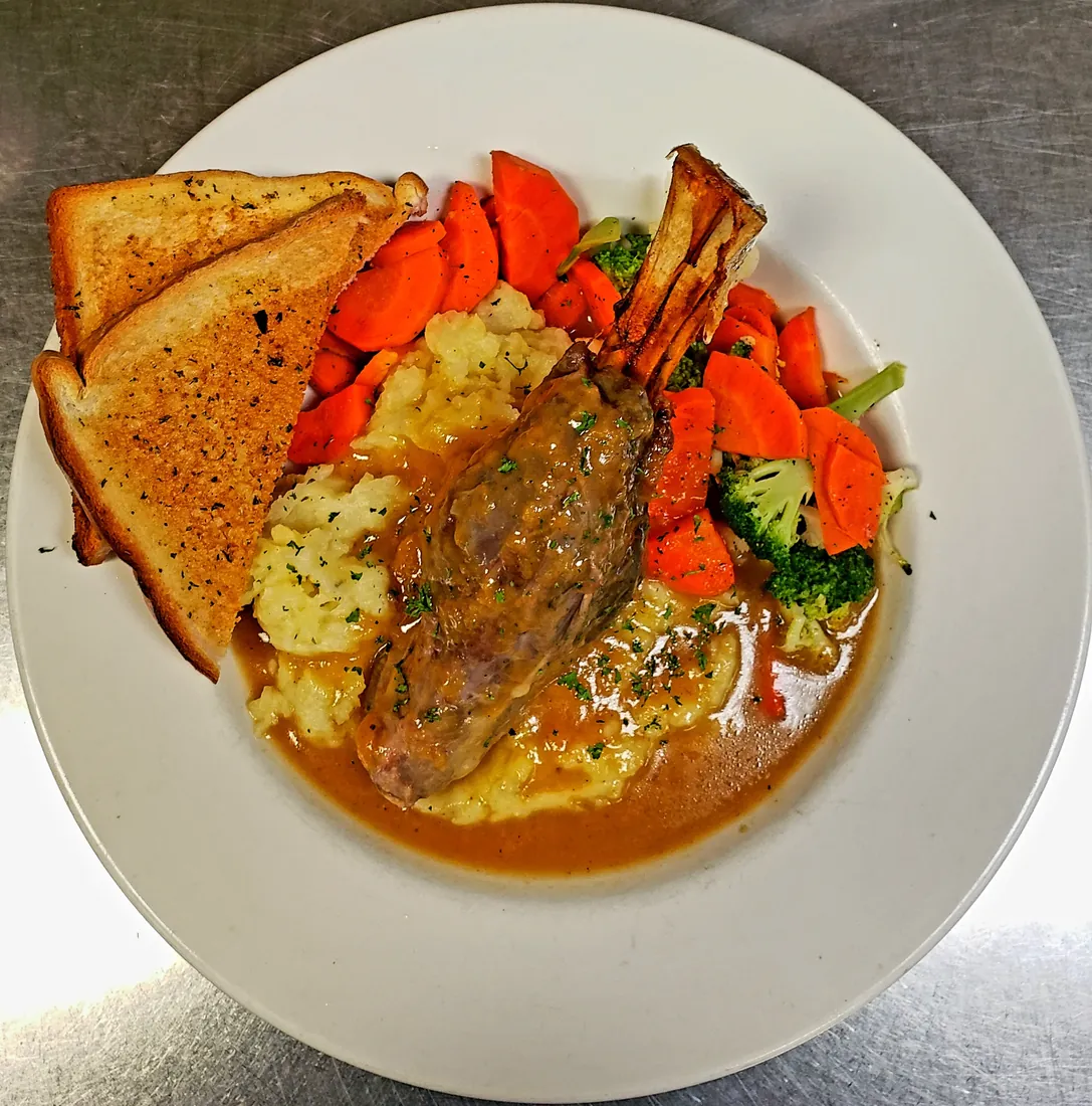 Lamb Shank - Slow-cooked lamb with mashed potatoes and vegetables at Cheryl's Country Kitchen in Airdrie