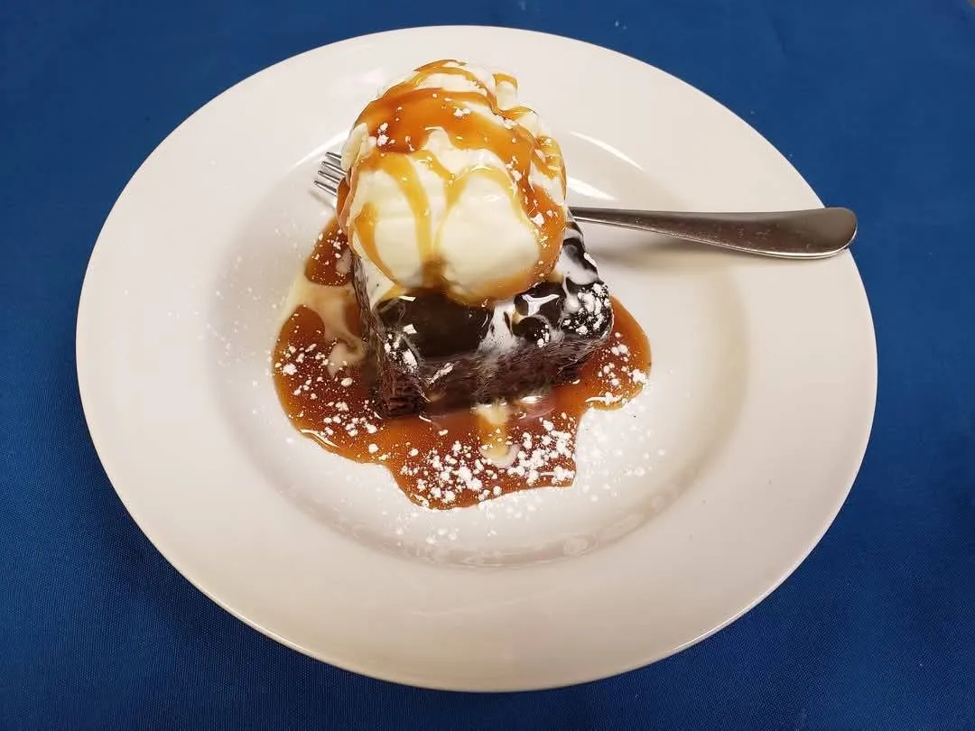 Sticky toffee pudding with vanilla ice cream and caramel sauce at Cheryl's Country Kitchen near Bayside, Airdrie